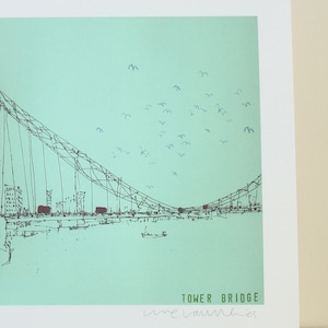 May include: A black and white line drawing of the Tower Bridge in London, England. The bridge is set against a light blue sky with a flock of birds flying overhead. The text "TOWER BRIDGE" and the artist's signature "lime laumkiel" are visible at the bottom of the image.