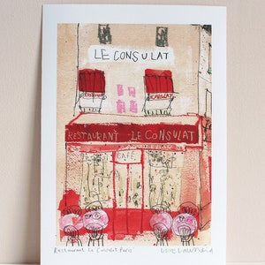 May include: A watercolor illustration of a Parisian cafe called "Restaurant Le Consulat" with red awnings and a cafe sign. The cafe is depicted with a red facade and windows with handwritten notes. The illustration is signed "Live Launeid" in the bottom right corner.