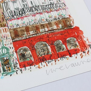 May include: A watercolor painting of a red building with arched windows and the text "La Cafe de Rome" above the windows. The building is surrounded by other buildings and a street scene. The painting is signed "Vrelaumeid" in the bottom right corner.