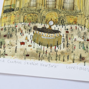 May include: A watercolor illustration of Grand Central Station in New York City. The illustration features a busy scene with many people walking around the station. The station's iconic clock is visible in the background. The artist's signature, "Luke Laurie", is written in the bottom right corner.