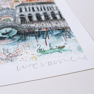 May include: A watercolor painting of a cityscape with a bridge, gondolas, and buildings. The artist's signature "me vanid" is in the bottom right corner.