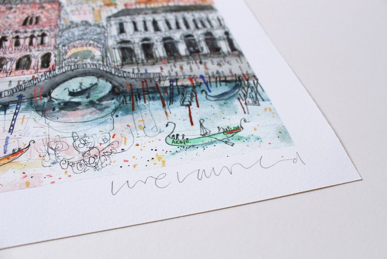 May include: A watercolor painting of a cityscape with a bridge, gondolas, and buildings. The artist's signature "me vanid" is in the bottom right corner.
