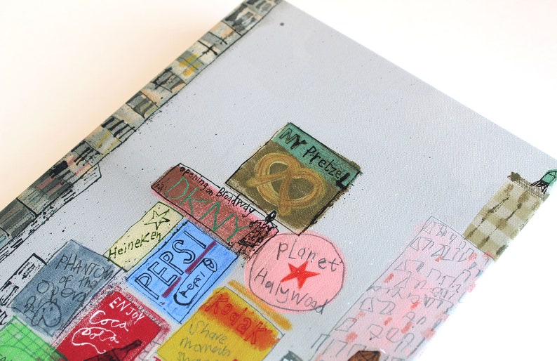 May include: A colorful illustration of a city scene with various signs and buildings. The signs include "Pepsi", "Planet Hollywood", "Kodak", "Phantom of the Opera", "Enjoy Coca Cola", "Heineken", "My Pretzel", and "Opening on Broadway".
