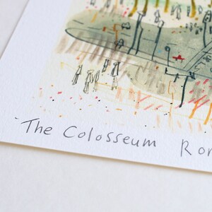 May include: Watercolor illustration of the Colosseum in Rome. The artwork features a sketch-like style with muted colors, including greens, grays, and touches of red and orange. The text "The Colosseum Rome" is handwritten at the bottom.