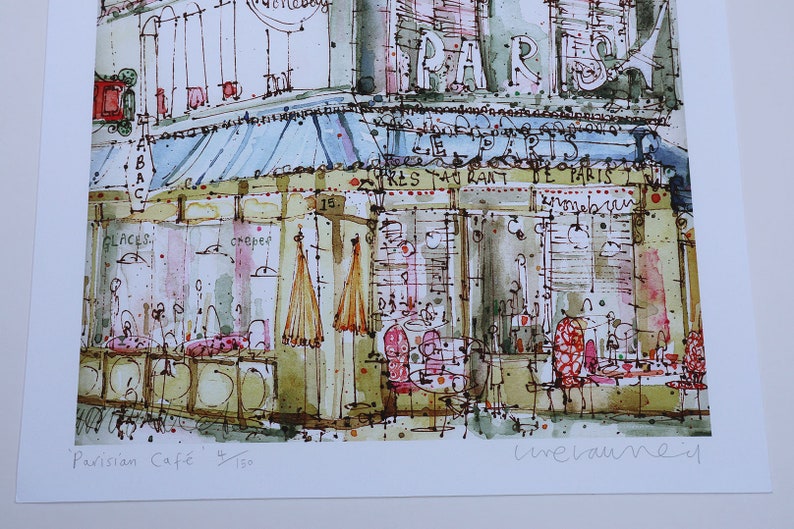 May include: A watercolor painting of a Parisian cafe with a blue awning, red chairs, and a sign that reads "Restaurant de Paris". The painting is signed "urevaunein" and titled "Parisian Cafe 150".