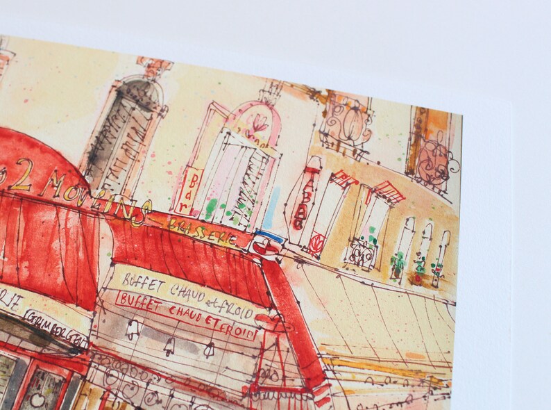 May include: Watercolor painting of a Parisian street scene with a red awning over a brasserie. The artwork features architectural details, including windows, signs, and the text "2 MOULINS BRASSERIE". The color palette includes red, yellow, and brown.