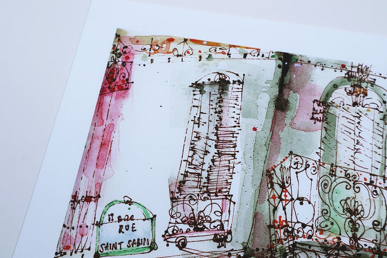 May include: A watercolor painting of a street scene in Paris, France. The painting features a building with a green door and a sign that reads "11 Rue Saint Sabin". The building is painted in shades of green, brown, and pink.
