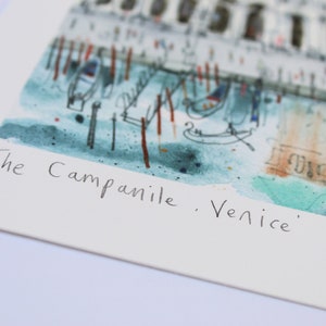 May include: A watercolor painting of the Campanile in Venice, Italy. The painting is in a muted color palette of blues, greens, and browns. The Campanile is depicted in the background, with gondolas and other details in the foreground. The text "The Campanile, Venice" is written in black ink at the bottom of the painting.