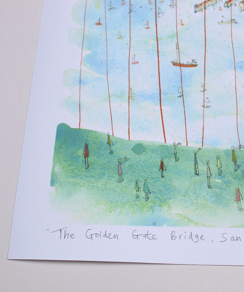 May include: A watercolor print featuring a green grassy hill with stick-figure people and a blue sky filled with small boats and vertical red lines. The text at the bottom reads The Golden Gate Bridge, San. The artwork uses a light color palette.