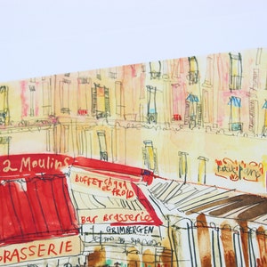 May include: Watercolor painting of a Parisian street scene featuring a cafe with a red awning and the text "CAFE des 2 Moulins". The artwork depicts buildings with detailed architectural elements and various signs.
