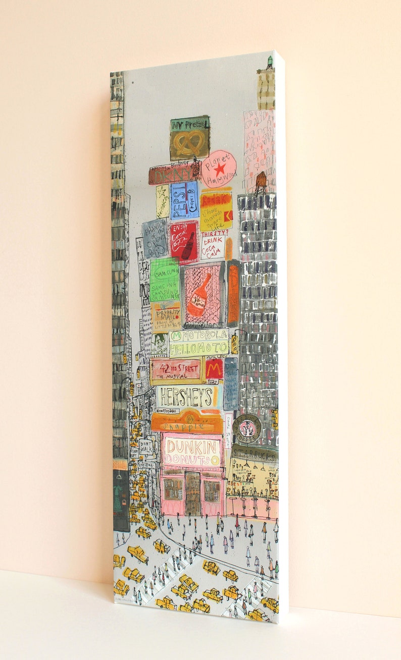 May include: A watercolor painting of a busy city street scene with tall buildings and many signs. The signs include the names of popular brands like Dunkin Donuts, Hershey's, and Planet Hollywood. There are many people walking on the street and yellow taxis.