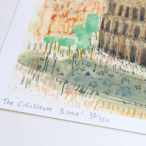May include: Watercolor print of the Colosseum in Rome, Italy. The artwork depicts the ancient amphitheater with a busy street in the foreground. The print is numbered 25/150 and includes the text "The Colosseum Rome".