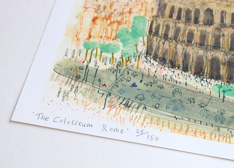 May include: Watercolor print of the Colosseum in Rome, Italy. The artwork depicts the ancient amphitheater with a busy street in the foreground. The print is numbered 25/150 and includes the text "The Colosseum Rome".