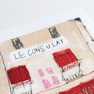May include: A hand-drawn illustration of a building with the text "LE CONSULAT" above a red window with the text "RESTAURANT" below it. There is a pink window with the text "LE CONSULAT" below it. The building is drawn in a cartoon style with a textured background.