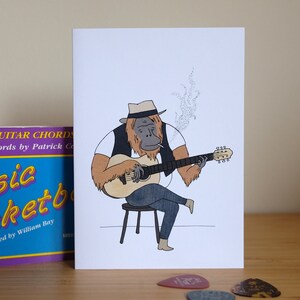 Orangutan guitarist A6 Greetings Card image 2