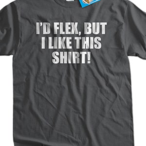 May include: A dark gray t-shirt with the text "I'd flex, but I like this shirt!" printed in white.