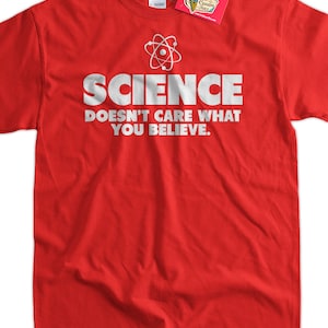 May include: Red t-shirt with a white atom symbol and the text "SCIENCE DOESN'T CARE WHAT YOU BELIEVE."