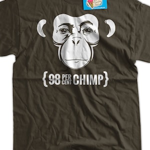May include: A dark brown t-shirt with a white chimpanzee face and the text "98 per cent chimp" printed on the front.