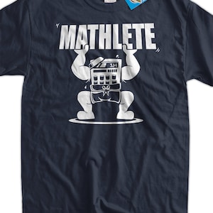 May include: A navy blue t-shirt with a white graphic of a calculator with arms and legs lifting a weight that says "MATHLETE".