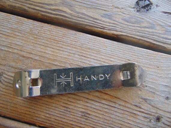 Vintage handy Button Souvenir Bottle Opener & Can Punch vintage