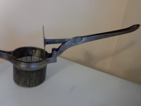 Old potato ricer discount