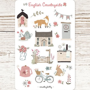 May include: A sticker sheet featuring illustrations of the English countryside. The sheet includes images of a fox, a house, a bicycle with a basket, a teapot, and the text "English Countryside" and "- countrykitty -."