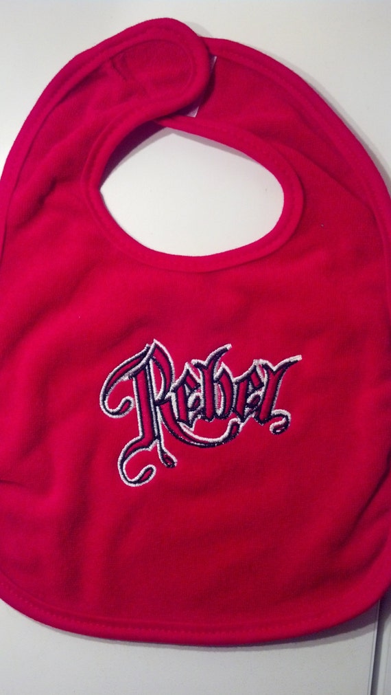 Items similar to Rebel tattoo style Embroidered Baby Bib on Etsy