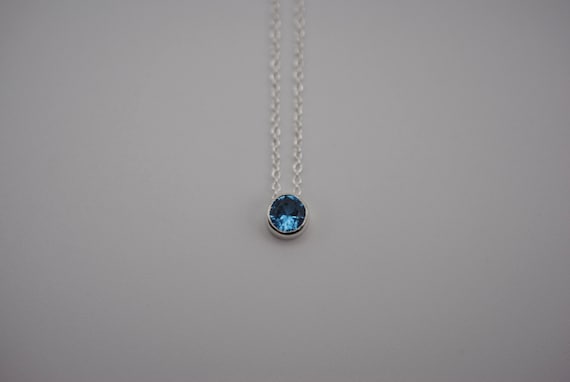 Birthstone Necklace: Round Blue Zircon, Bezel, Silver, Cable Chain