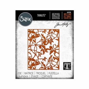May include: A copper-colored metal die cut with a floral design. The die cut is labeled "Thinlits" and "665436" and features the name "Jim Holtz". The die cut is for use with a die-cutting machine.