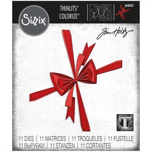 May include: Red bow die cut for crafting. The die cut is made by Sizzix and is part of the Thinlits Colorize collection by Jim Holtz. The die cut is labeled with the number 666063.