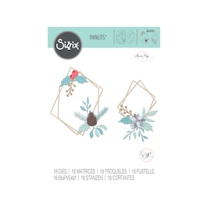 May include: Sizzix Thinlits die set featuring two geometric frames with winter foliage. The frames are gold with light blue, green, and red accents. The set includes 18 dies. The text on the packaging reads "Thinlits" and "664583".