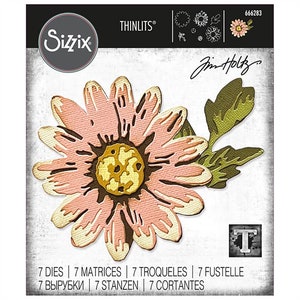 May include: A set of seven die-cut metal stencils for crafting. The stencils feature a pink and yellow daisy with green leaves. The package includes the text "THINLITS®" and "Jim Holtz".
