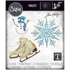 May include: A set of 10 metal dies for crafting. The dies feature a snowflake, ice skates, and a snowman. The dies are designed by Jim Holtz for Sizzix.