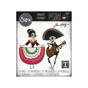 May include: A Sizzix Thinlits die set featuring two Day of the Dead figures. One figure is a female skeleton in a colorful dress, and the other is a male skeleton playing a guitar. The set includes 21 dies for crafting projects.