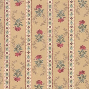 May include: A beige fabric with a repeating pattern of pink flowers and blue leaves. The pattern is arranged in vertical stripes.