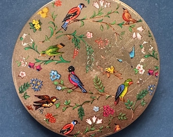 Preciosa polvera STRATTON de mediados de siglo con pájaros esmaltados sobre oro.