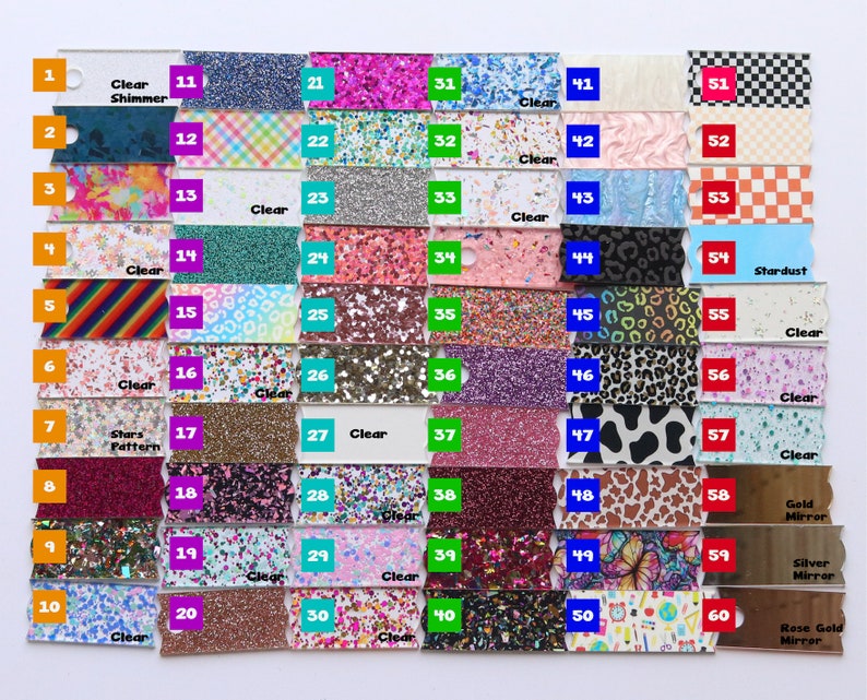 May include: A color chart featuring 60 different acrylic and glitter sheets. The samples include various colors, patterns, and finishes, such as glitter, shimmer, and mirror effects. Each sample is labeled with a number and a description.