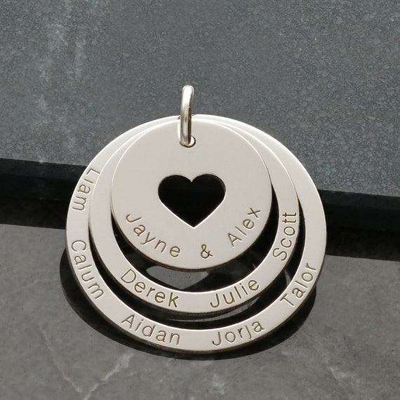 Sterling Silver Cutout Disc with Heart Charms Necklace Sterling Silver Cutout Disc with Heart Charms Necklace
