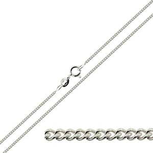 May include: A silver curb chain necklace with a lobster clasp.