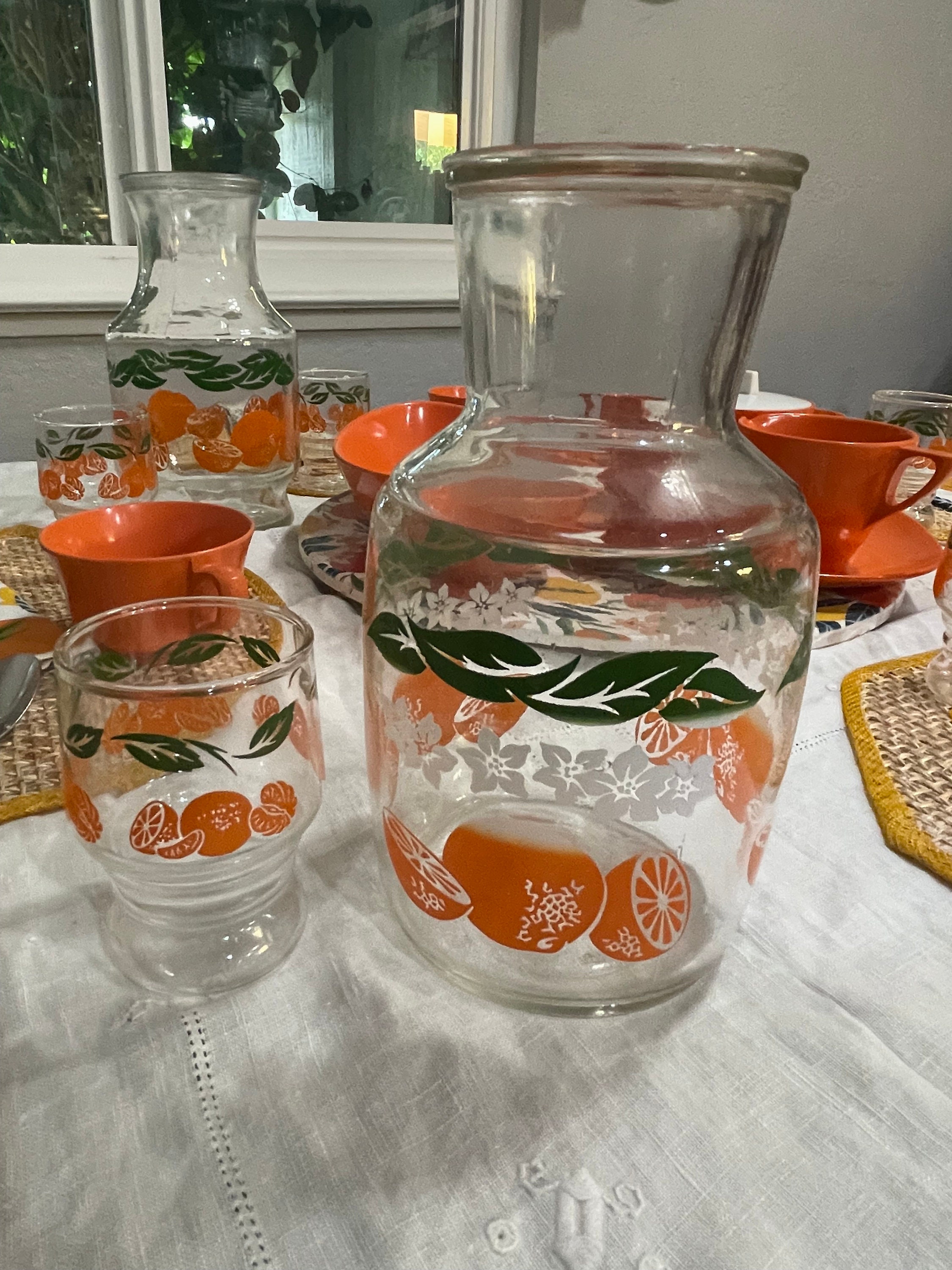 Vintage Anchor Hocking spring and bridge Glass Jars With Red and Orange  Plastic Lids. Juice Carafe. 
