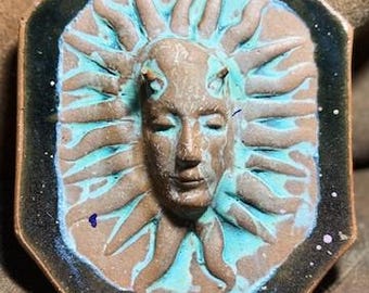 Mini cara de sol con cuernos