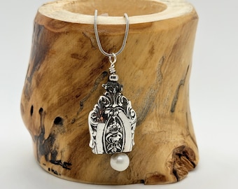 Wallace, Rose Point, Sterling Silver Knife Bell Pendant with Pearl, from 1934