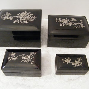 Asian Black Lacquered Nesting Boxes Set,  4 Vintage 1970s plastic storage with etched silver flowers under lacquer glaze, from Hong Kong