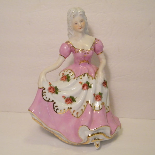 Musical Lady Figurine plays waltz tune, Unknown title, Vintage Porcelain Lady in Pink dress appears ready to dance at ball, 9.75 inch tall