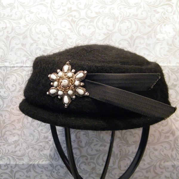 Black Wool Felt Pillbox Hat by KPM, Vintage Mid Century fashion with wire and bead brooch and plastic ribbon accent, gift for her