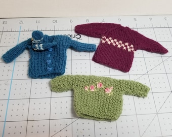 3 miniature doll sweaters