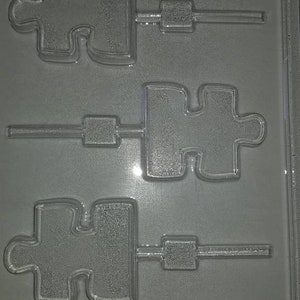 M223- Puzzle Piece Chocolate Lollipop Mold