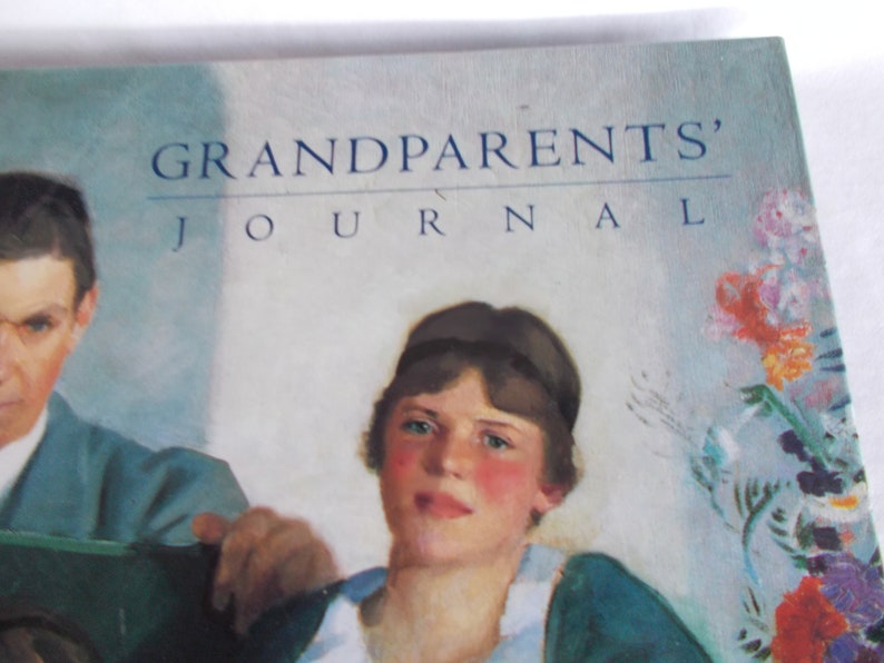 May include: A book cover with the title "Grandparents' Journal" in blue text. The cover features a painting of a man and a woman, with a floral design in the background.