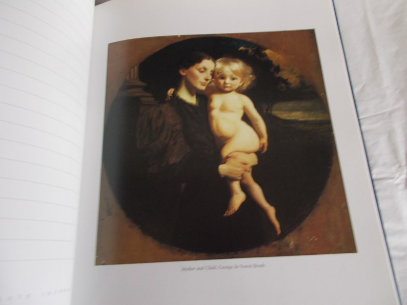 May include: A painting of a woman holding a young child. The woman is wearing a dark dress and the child is nude. The painting is set in a dark, shadowy room.