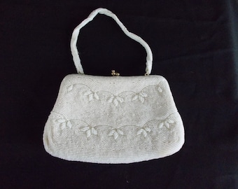 small white pocketbook